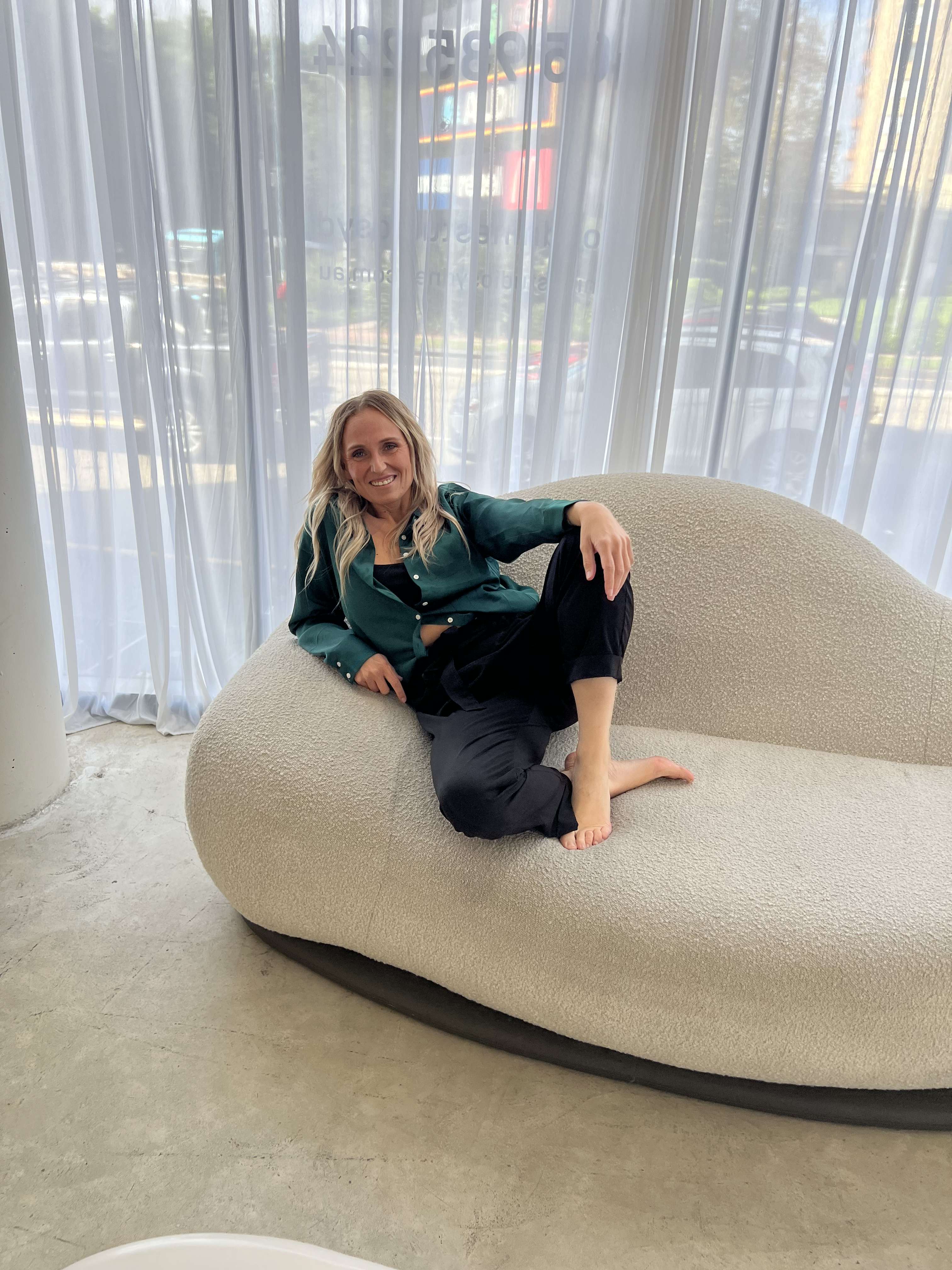 Shanise Mokoroa smiling in a light-filled studio